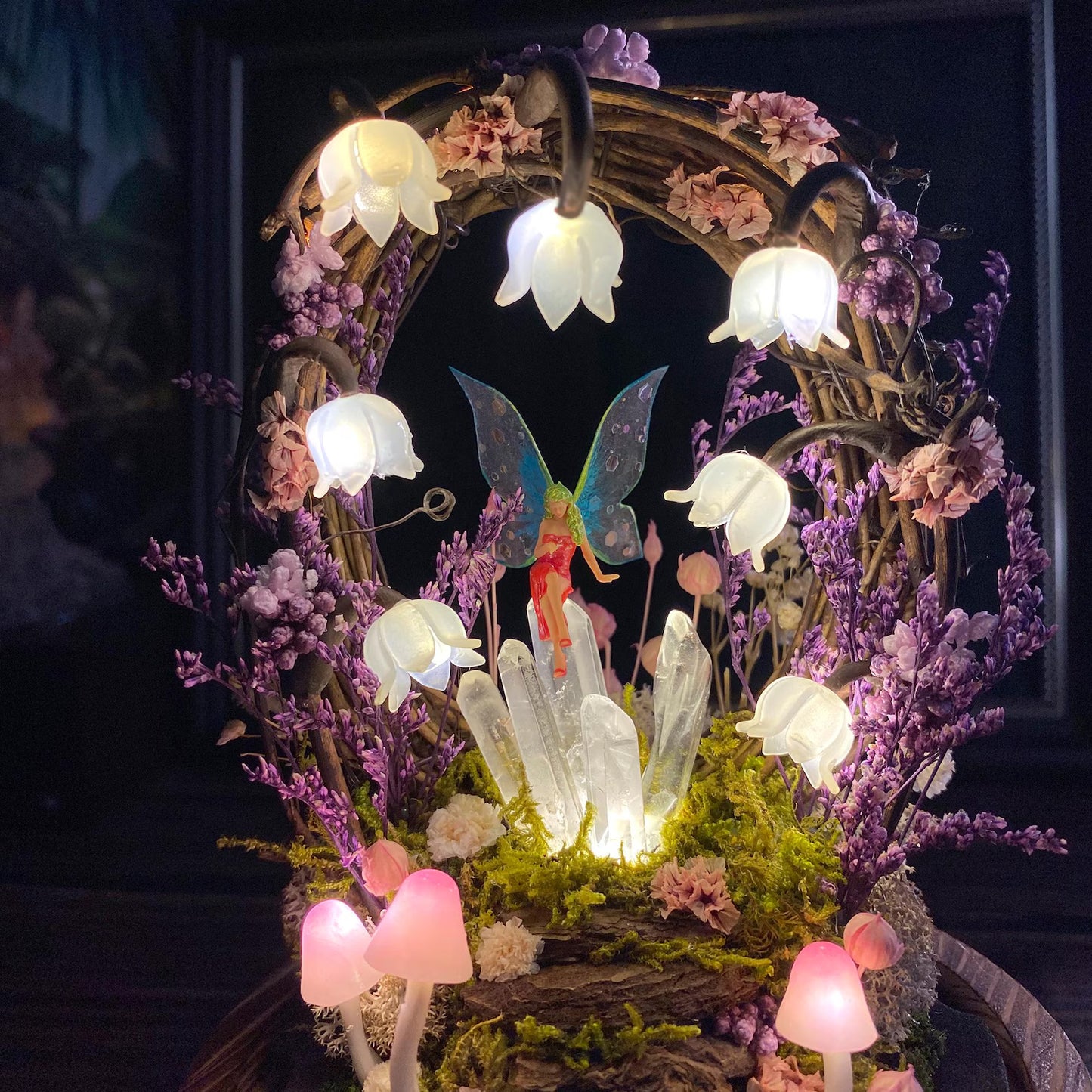 Flower lamp with glowing crystal